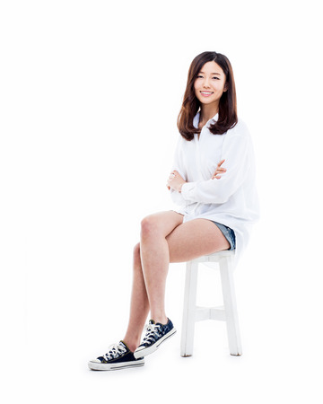 Young Asian woman full shot isolated on white background.の写真素材