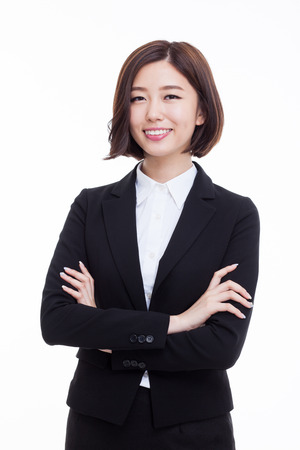 Yong pretty Asian business woman isolated on white background.の写真素材
