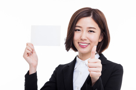 Business woman showing blank card. isolated over whiteの写真素材