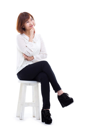 Young Asian woman full shot isolated on white background.の写真素材