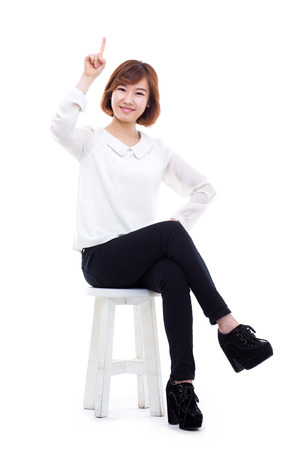 Asian woman present something isolated on white background.の写真素材