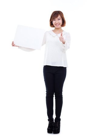 Asian woman showing banner isolated on white background.の写真素材
