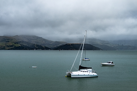 Landscape around Akaroa town on the Banks Peninsula, southeast of Christchurch, New Zealand.の写真素材
