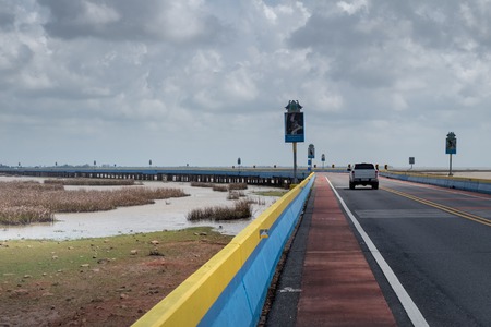 Highway across the dried sea in Pattalung district, Southern of Thailand.の写真素材