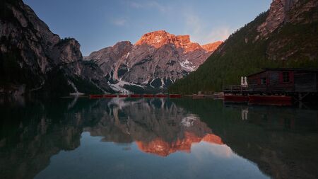 Braies Lake (Lago di Braies) at sunrise in Dolomites mountains, Italyの写真素材