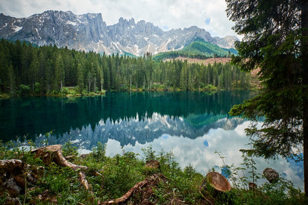 Landscape of Carezza Lake, a small alpine lake in the Dolomites in South Tyrol, Italy