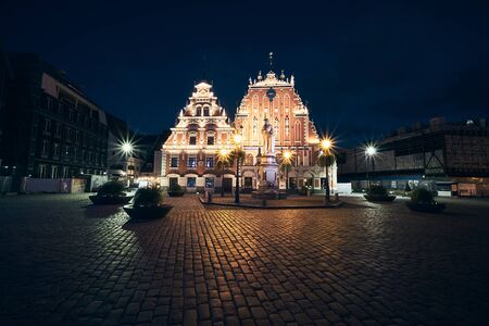 The House of the Blackheads Light Up in the old town of Riga, Latviaの写真素材