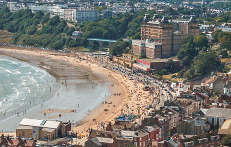 SCABOROUGH, UK - SEP 2, 2018: People walking and relaxing around Scaborough city in the sunny day, United Kingdomのeditorial素材