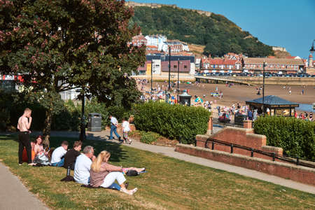 SCABOROUGH, UK - SEP 2, 2018: People walking and relaxing around Scaborough city in the sunny day, United Kingdomのeditorial素材