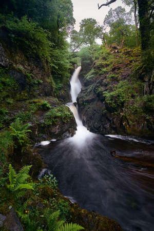 The landscape of Aira Force, a waterfall near Ullswater in Lake district, United Kingdomの写真素材