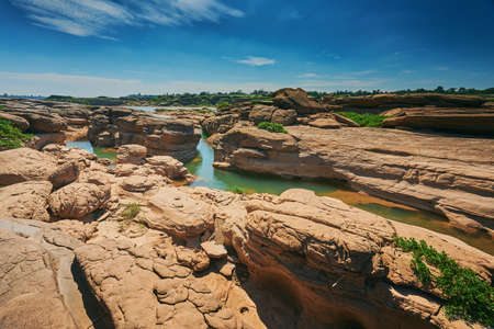 A landscape of Hat Chom Dao or Kaeng Chom Dao in Mekong river, located at Ubon Ratchathani province, Thailandの写真素材