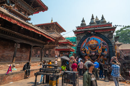 Kathmandu, Nepal - Apr 17, 2023: People visiting and worshiping Kaal Bhairav, a a Hindu shrine located in Kathmandu Durbar Square, a UNESCO World Heritage Site.のeditorial素材