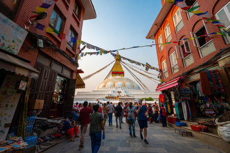 Kathmandu, Nepal - Apr 17, 2023: People and locals visiting Boudhanath, a stupa in Kathmandu, Nepal. Its massive mandala makes it one of the largest spherical stupas in Nepal and the world.のeditorial素材