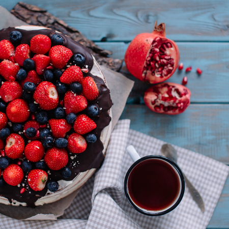 chocolate cake with berries and mint on the standの写真素材