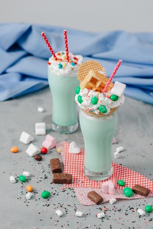 composition of ice cream cocktails with decorations in a glass Cupの写真素材