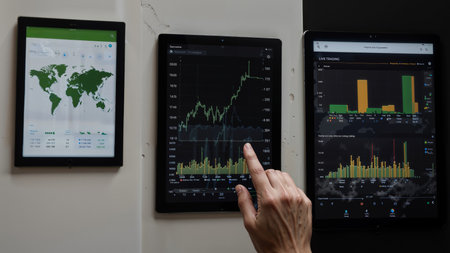 Stock market chart on the screen of a mobile phone. Business conceptの素材