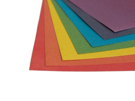 Detail of colored paper lists isolated on white background