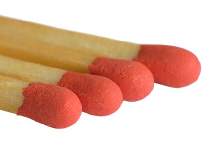 Close up matches head isolated in whiteの写真素材