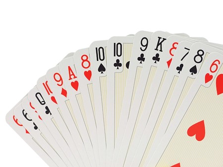 Playing cards over white