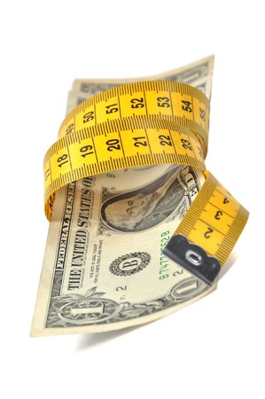 Dollar banknote and measure tapeの写真素材