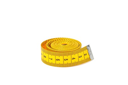 Measure tape over white