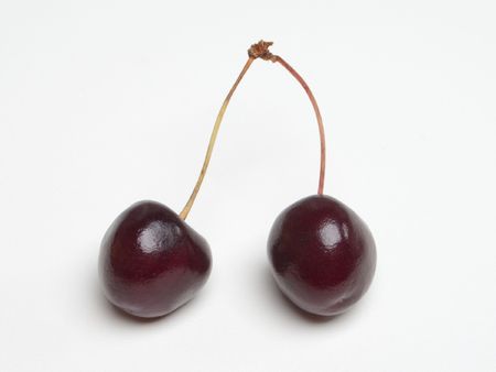 Healthy food - sweet red cherry berry on whiteの写真素材