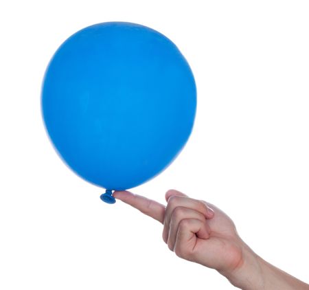 Blue color balloon in human hand on fun partyの写真素材