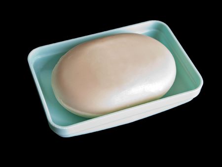 Hygiene care and beauty soap bar isolated on blackの写真素材