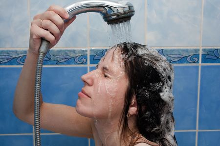 Beauty women take shower in bathroom for hair careの写真素材