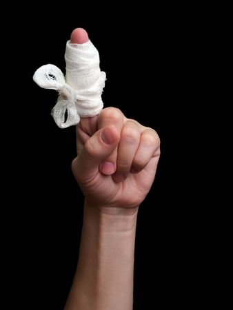 White medicine bandage on human injury hand fingerの写真素材