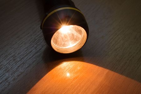 Flashlight lighting equipment bright illuminatedの写真素材