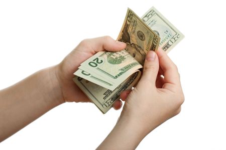 Finance wealth human hand holding dollar currencyの写真素材