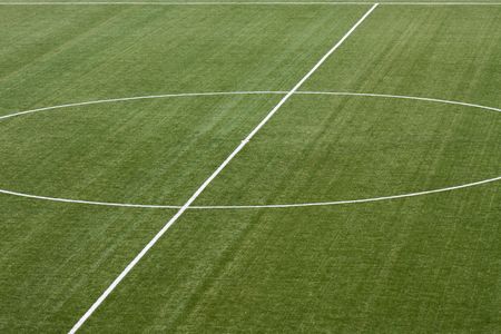 Playing soccer sport green grass field background