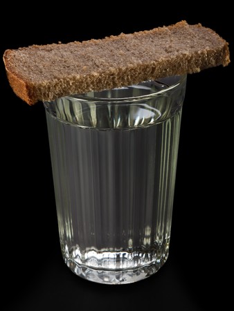 Bread food portion on vodka alcohol drinking glassの写真素材