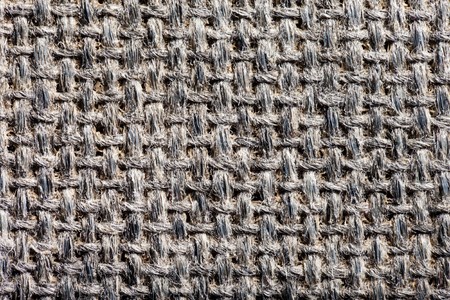 Textile material woven pattern textured backgroundの写真素材