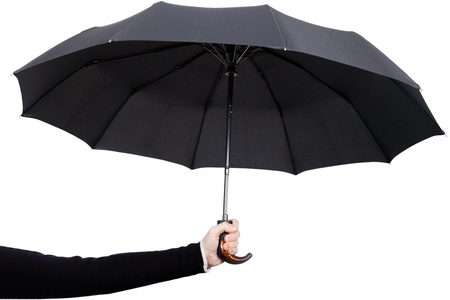 Women hand holding rain wet weather black umbrellaの写真素材