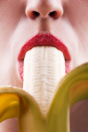 Sex symbol women sucking eating banana fruit foodの写真素材