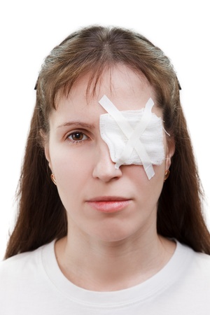 Medicine plaster patch on human injury wound eyeの写真素材