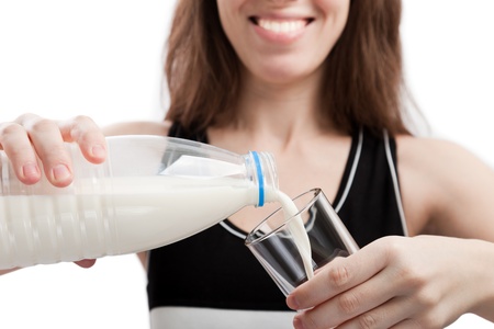 Smiling women drinking healthy lifestyle milk foodの写真素材