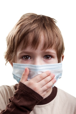 Flu illness child boy in medicine healthcare maskの写真素材