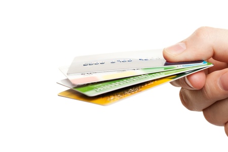 Human hand holding business finance credit cardsの写真素材