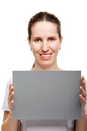 Smiling women hand holding grey empty blank cardの写真素材