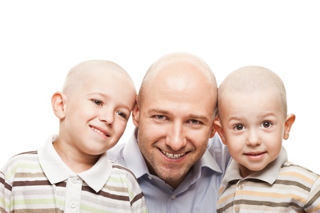 Smiling father and little sons - family happinessの写真素材