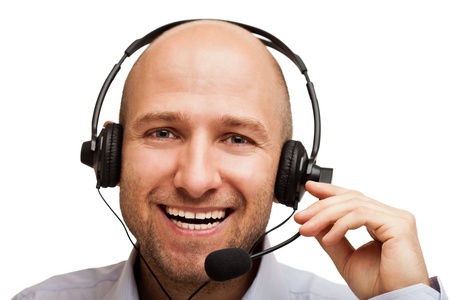 Smiling business man talking headphones or headsetの写真素材