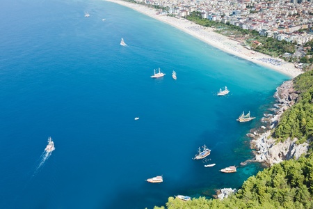 Summer vacations - blue Mediterranean sea and Cleopatra sand beach resort of Turkey Alanya view from ancient mountain castle wallの写真素材