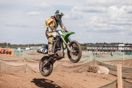 SEMIGORJE, RUSSIA - JULY 22: Grand Prix of Russia of FIM Motocross World Championship MX1 and MX2 Series on July 22, 2012 in Semigorje, Russiaのeditorial素材