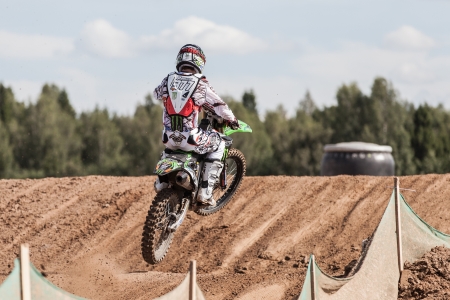 SEMIGORJE, RUSSIA - JULY 22: Grand Prix of Russia of FIM Motocross World Championship MX1 and MX2 Series on July 22, 2012 in Semigorje, Russiaのeditorial素材