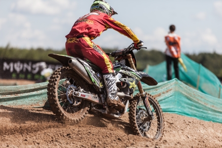 SEMIGORJE, RUSSIA - JULY 22: Grand Prix of Russia of FIM Motocross World Championship MX1 and MX2 Series on July 22, 2012 in Semigorje, Russiaのeditorial素材