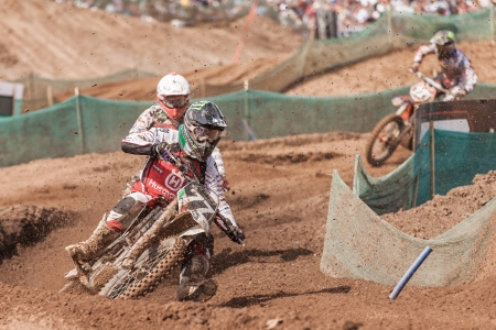 SEMIGORJE, RUSSIA - JULY 22: Grand Prix of Russia of FIM Motocross World Championship MX1 and MX2 Series on July 22, 2012 in Semigorje, Russiaのeditorial素材