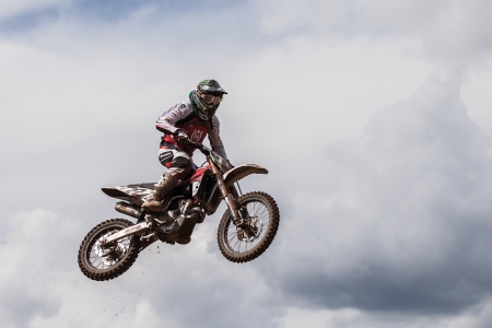 SEMIGORJE, RUSSIA - JULY 22: Grand Prix of Russia of FIM Motocross World Championship MX1 and MX2 Series on July 22, 2012 in Semigorje, Russiaのeditorial素材